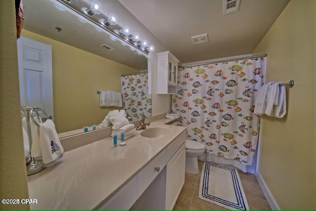 full bath with tile patterned floors, vanity, visible vents, and toilet