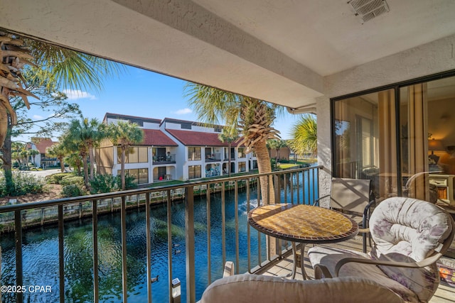 520 N Richard Jackson Blvd Unit 2209, Panama City Beach, FL 32407 - balcony with a water view, a residential view, and visible vents