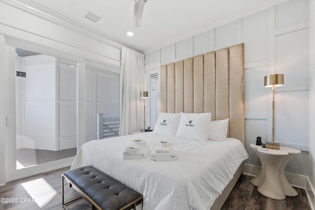 12401 Front Beach Rd, Panama City Beach, FL 32407 - bedroom with recessed lighting, visible vents, and wood finished floors