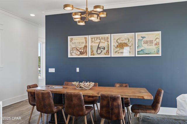12401 Front Beach Rd, Panama City Beach, FL 32407 - dining room with baseboards, ornamental molding, a chandelier, recessed lighting, and wood finished floors