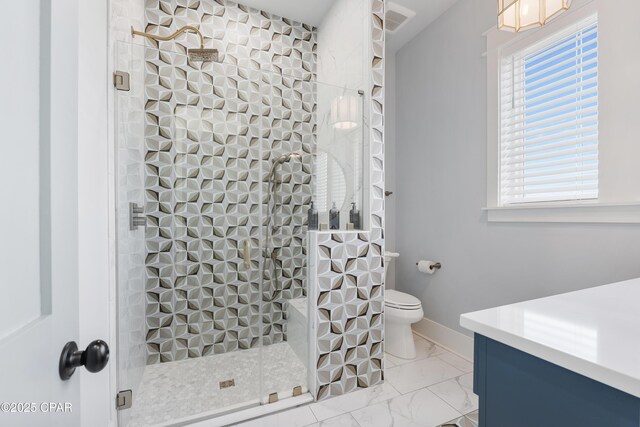 12401 Front Beach Rd, Panama City Beach, FL 32407 - bathroom featuring toilet, tiled shower, marble finish floor, and baseboards