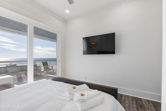 12401 Front Beach Rd, Panama City Beach, FL 32407 - bedroom featuring baseboards, dark wood finished floors, crown molding, recessed lighting, and access to outside