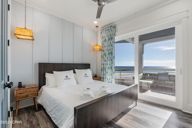 12401 Front Beach Rd, Panama City Beach, FL 32407 - bedroom with a water view, ornamental molding, a ceiling fan, wood finished floors, and access to exterior