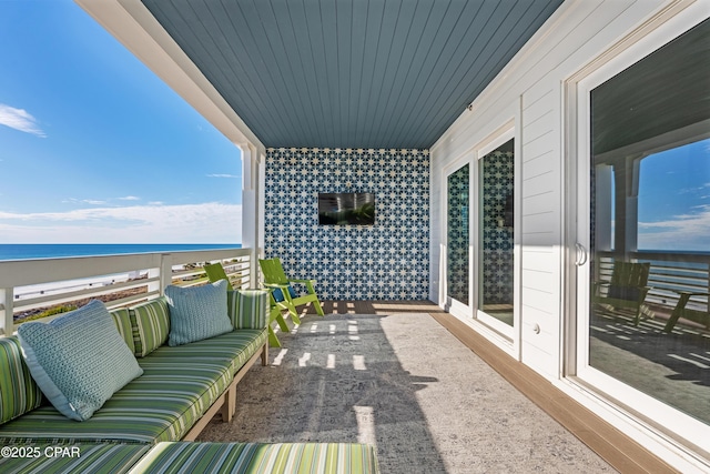 12401 Front Beach Rd, Panama City Beach, FL 32407 - balcony featuring an outdoor hangout area and a water view