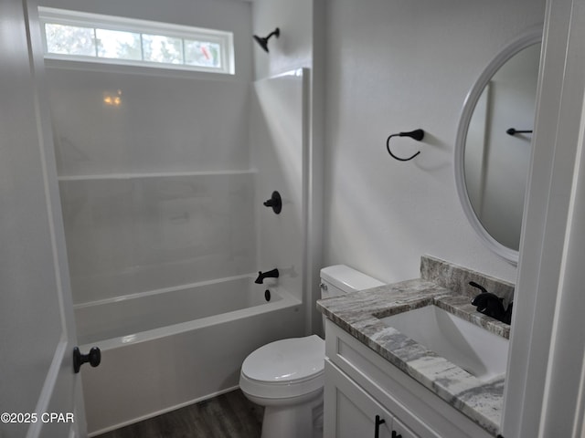 4610 Pineview Dr, Marianna, FL 32446 - bathroom with vanity, tub / shower combination, and wood finished floors