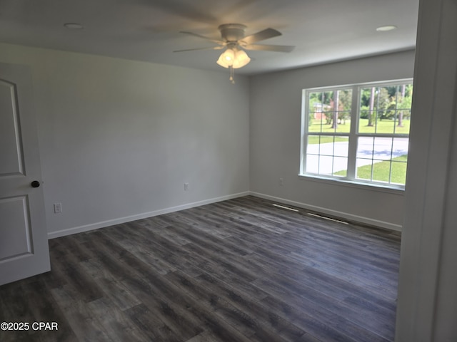 4610 Pineview Dr, Marianna, FL 32446 - empty room featuring a ceiling fan and dark wood-style flooring