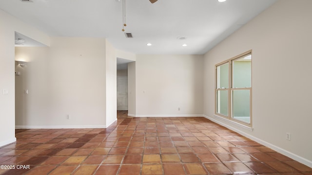empty room featuring recessed lighting, visible vents, baseboards, and a ceiling fan