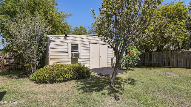view of shed featuring a fenced backyard