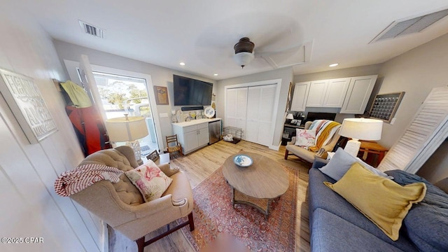 1314 Mcclelland Ave, Port St Joe, FL 32456 - living room with light wood-style flooring, ceiling fan, and recessed lighting
