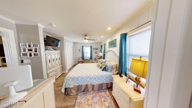 1314 Mcclelland Ave, Port St Joe, FL 32456 - bedroom with light wood finished floors, crown molding, recessed lighting, and ceiling fan