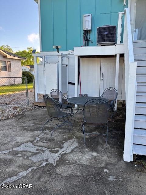 1314 Mcclelland Ave, Port St Joe, FL 32456 - view of patio featuring cooling unit and outdoor dining space