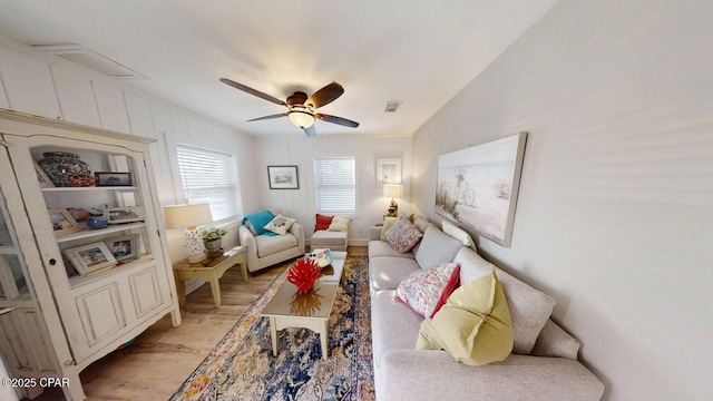1314 Mcclelland Ave, Port St Joe, FL 32456 - living area featuring light wood finished floors and a ceiling fan