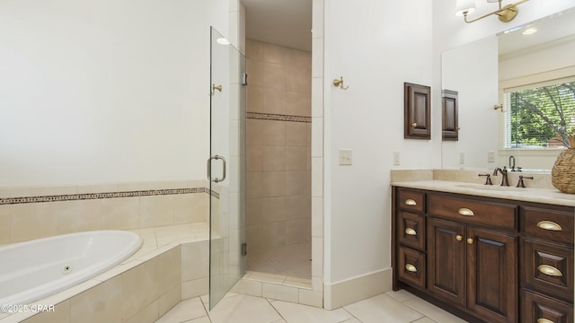 full bath with tile patterned flooring, a shower stall, vanity, baseboards, and a jetted tub