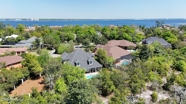 birds eye view of property featuring a residential view and a water view