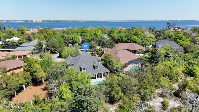 aerial view featuring a residential view and a water view