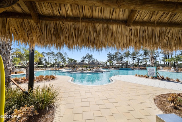 community pool with a patio