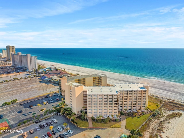 aerial view with a view of the beach and a water view