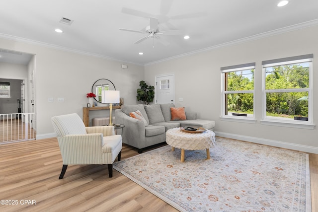 1106 E 3rd St, Panama City, FL 32401 - living room featuring light wood-style floors, baseboards, and recessed lighting