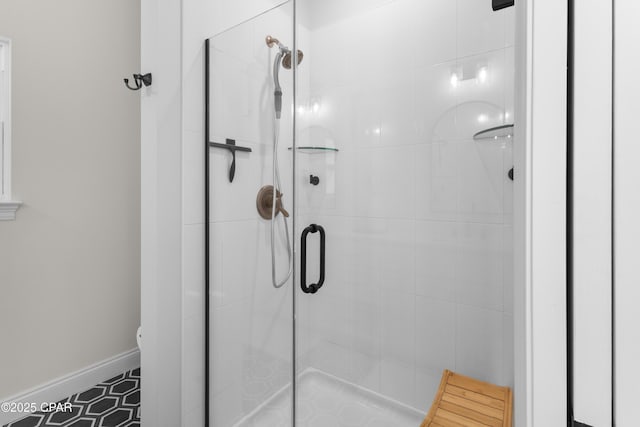 1106 E 3rd St, Panama City, FL 32401 - bathroom with a shower stall and baseboards