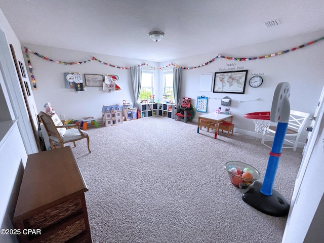 game room featuring carpet flooring and visible vents