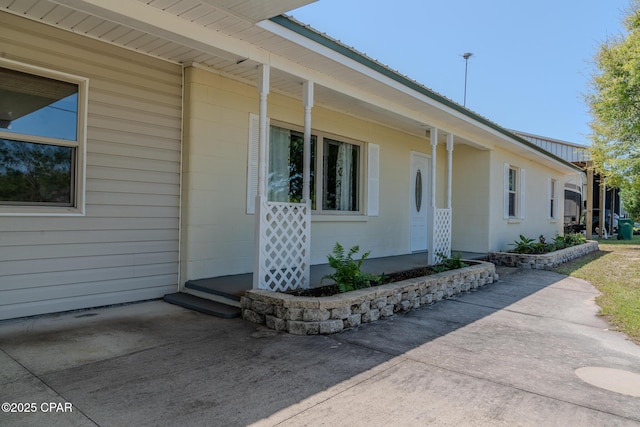 exterior space with concrete block siding