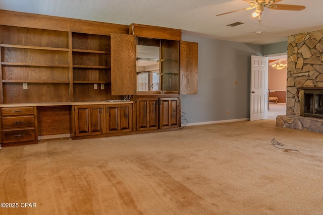 2613 Indian Springs Rd, Marianna, FL 32446 - unfurnished living room featuring light colored carpet, baseboards, a ceiling fan, and visible vents