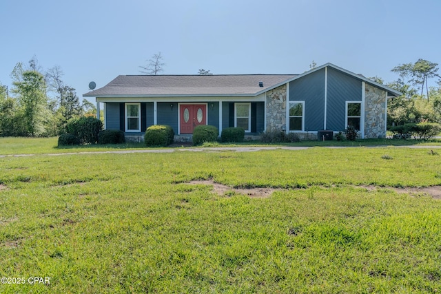 2613 Indian Springs Rd, Marianna, FL 32446 - view of front of house with stone siding and a front lawn