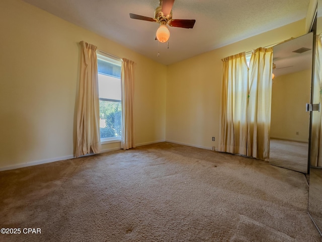 2613 Indian Springs Rd, Marianna, FL 32446 - carpeted spare room with baseboards and a ceiling fan