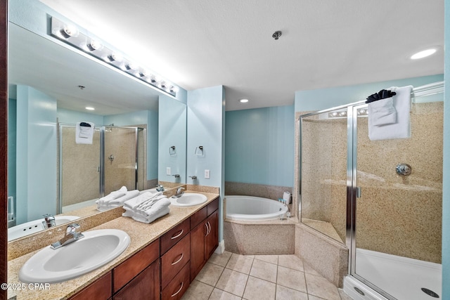 full bath featuring a shower stall, tile patterned floors, a garden tub, double vanity, and recessed lighting