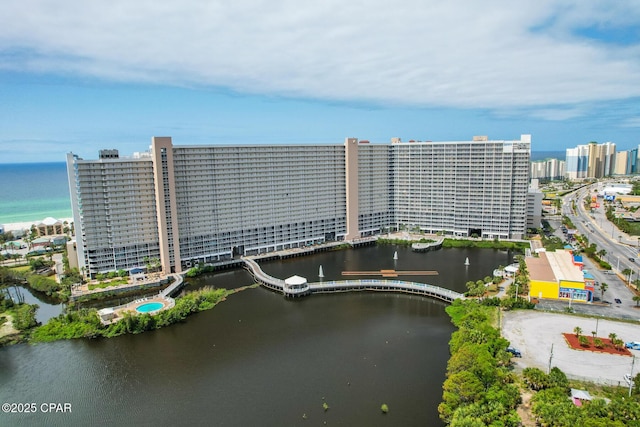 view of urban area featuring a large body of water