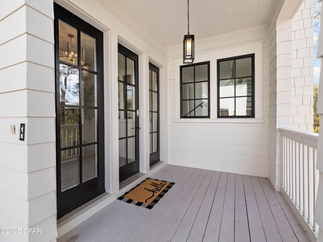 entrance to property with concrete block siding