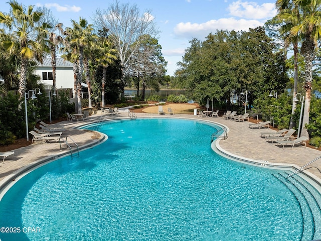 community pool with a patio