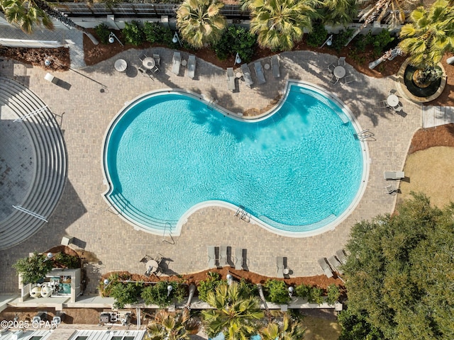 community pool featuring a patio area