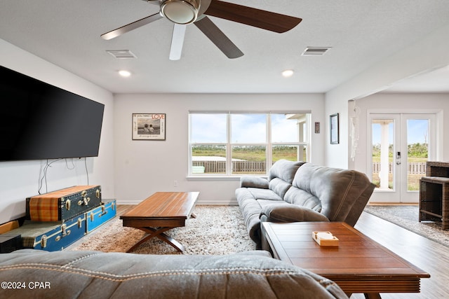 3946 Whitehead Blvd, Panama City, FL 32404 - living area featuring ceiling fan, french doors, wood finished floors, and visible vents
