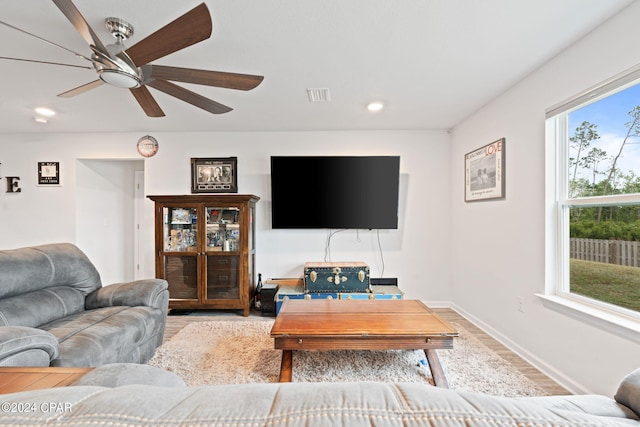 3946 Whitehead Blvd, Panama City, FL 32404 - living area with wood finished floors, visible vents, recessed lighting, and a healthy amount of sunlight