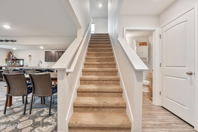 3946 Whitehead Blvd, Panama City, FL 32404 - staircase featuring wood finished floors and recessed lighting