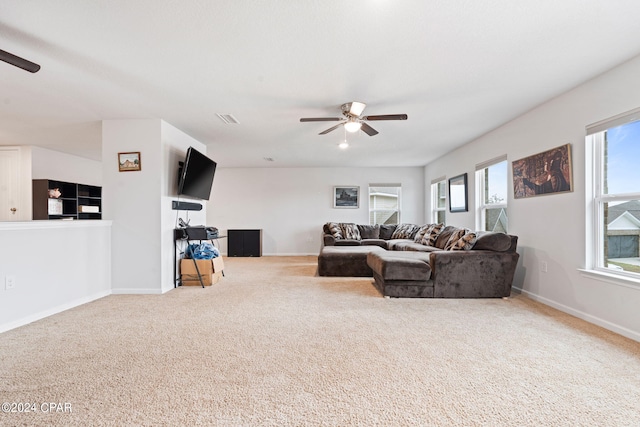 3946 Whitehead Blvd, Panama City, FL 32404 - carpeted living area with visible vents, baseboards, and ceiling fan