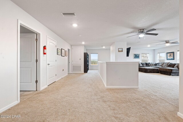 3946 Whitehead Blvd, Panama City, FL 32404 - interior space featuring light colored carpet, baseboards, a ceiling fan, and visible vents