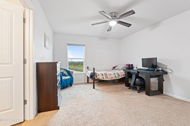 3946 Whitehead Blvd, Panama City, FL 32404 - bedroom with baseboards, a ceiling fan, and carpet flooring