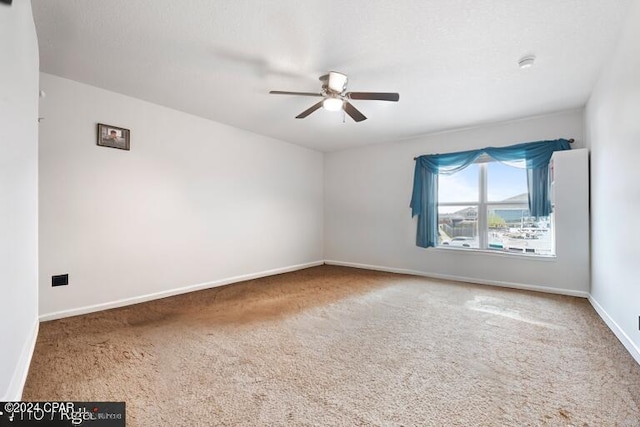 3946 Whitehead Blvd, Panama City, FL 32404 - carpeted empty room featuring baseboards and a ceiling fan