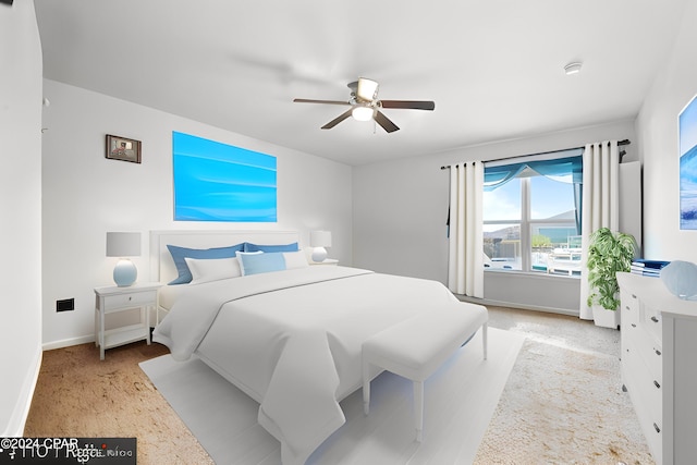 3946 Whitehead Blvd, Panama City, FL 32404 - bedroom with ceiling fan, baseboards, and light colored carpet