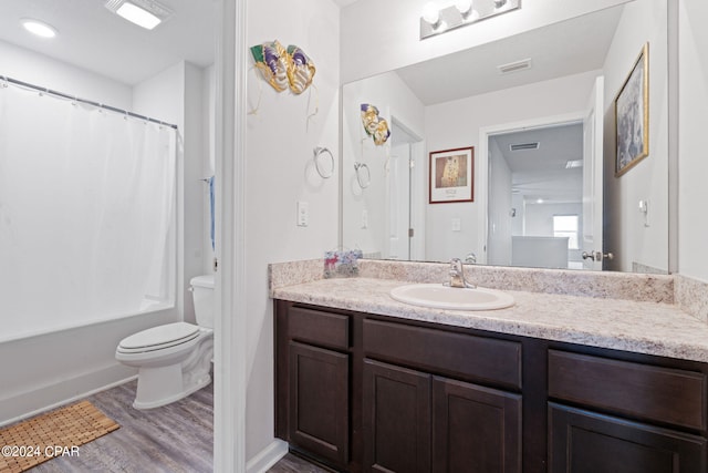 3946 Whitehead Blvd, Panama City, FL 32404 - bathroom featuring wood finished floors, visible vents, toilet, and vanity