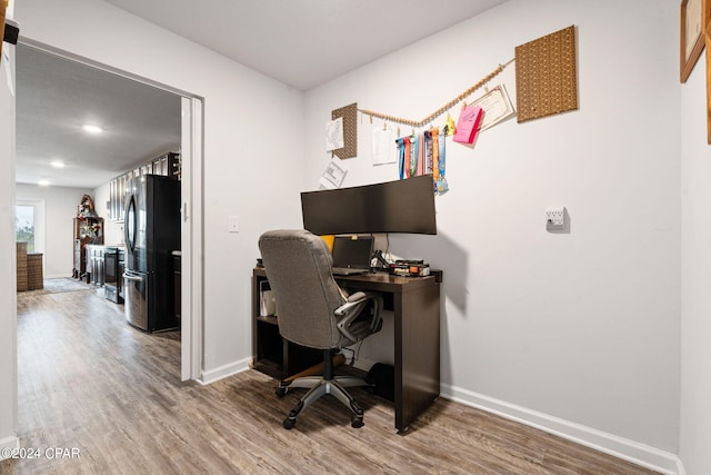 3946 Whitehead Blvd, Panama City, FL 32404 - office area featuring baseboards and wood finished floors
