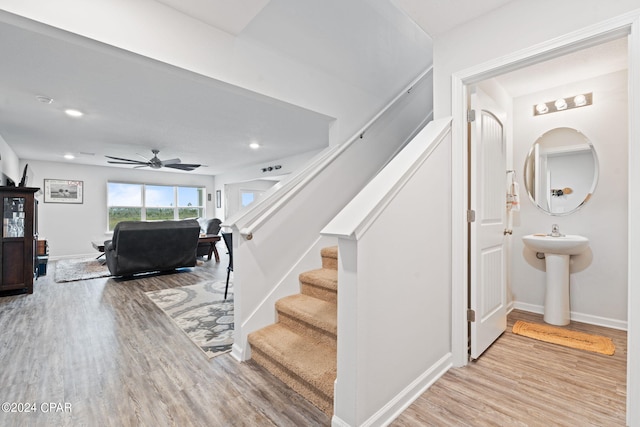 3946 Whitehead Blvd, Panama City, FL 32404 - stairway featuring ceiling fan, baseboards, wood finished floors, and recessed lighting