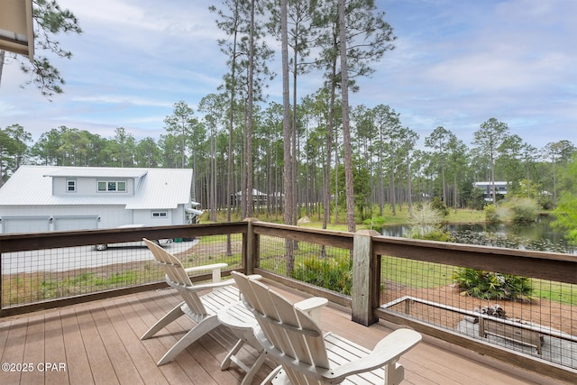 wooden deck featuring a water view