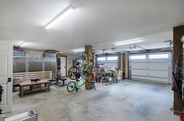 garage featuring a garage door opener
