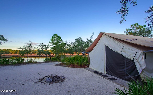 exterior space with a water view