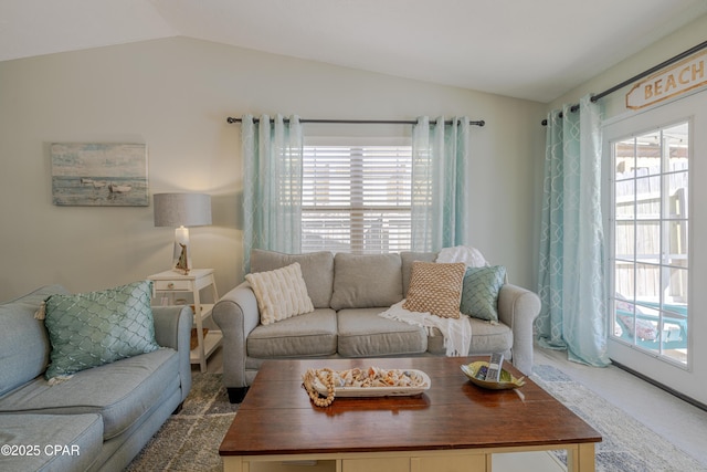 living room with vaulted ceiling