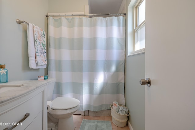 full bathroom featuring toilet, vanity, a shower with shower curtain, and tile patterned flooring