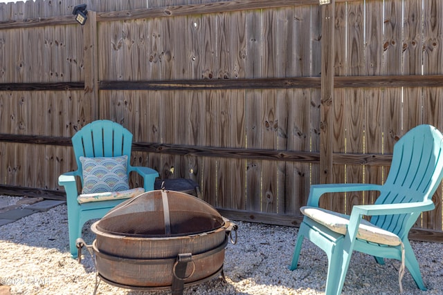 view of patio featuring fence